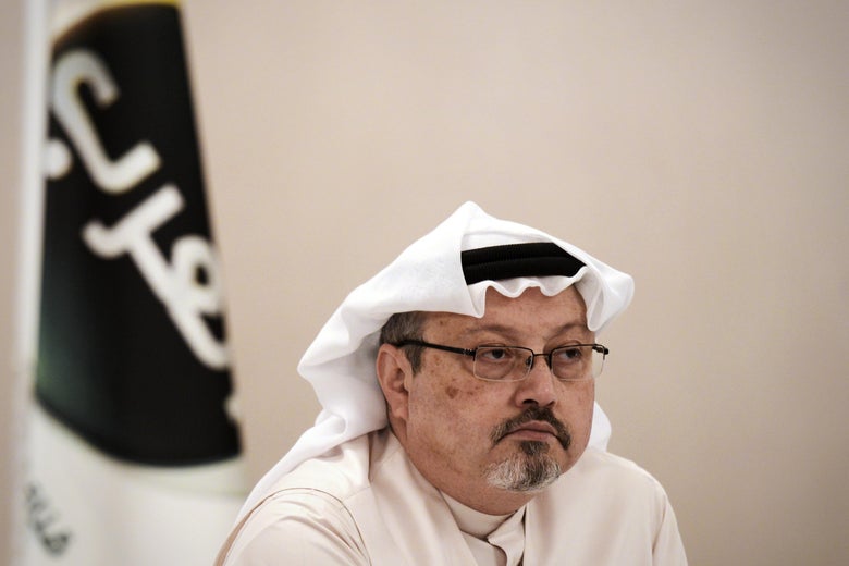 Jamal Khashoggi, looks on during a press conference in the Bahraini capital Manama, on December 15, 2014.